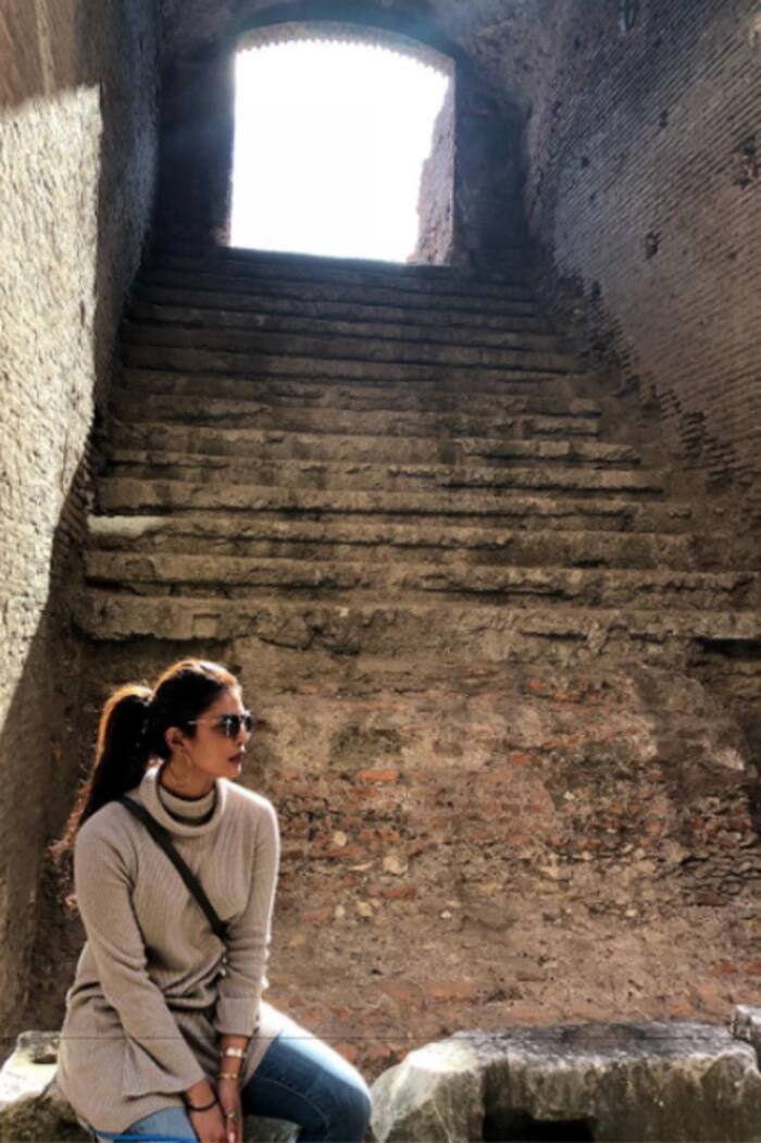 Priyanka Chopra poses at a monument in Rome