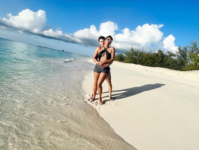 Priyanka Chopra poses in a black cutout swimsuit