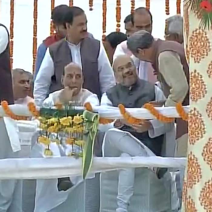 Rajnath Singh, Amit Shah attend live swearing in ceremony of Uttarakhand CM