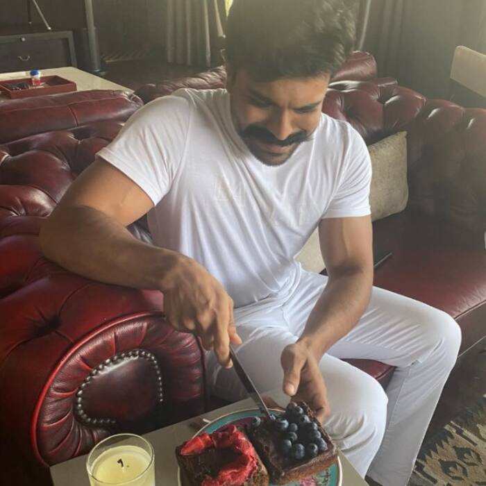 Ram Charan and the red chair
