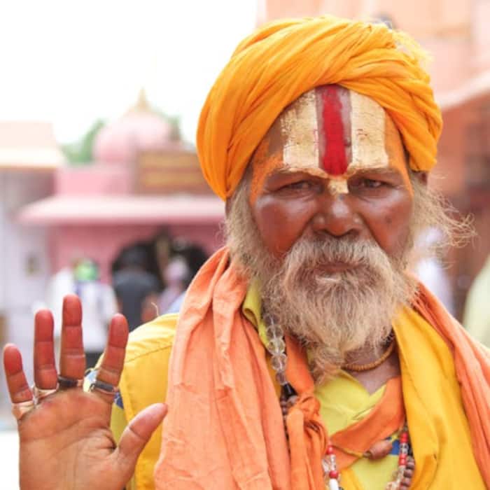 Rank 3 is Hinduism with 1,090,592,000 followers across various countries.