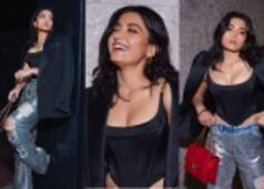 Rashmika Mandanna exudes a perfect blend of class and glam in oversized coat, chic corset and ripped jeans