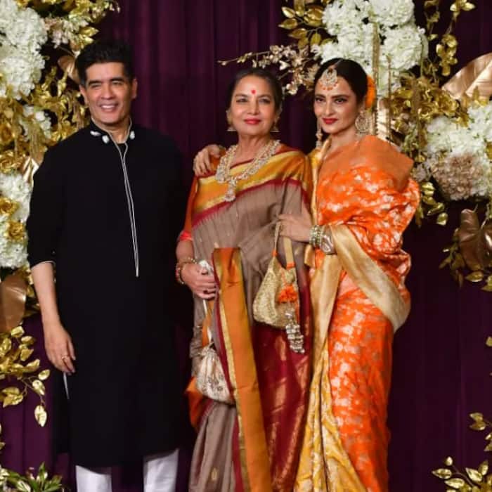 Rekha poses with Shabana Azmi and Manish Malhotra