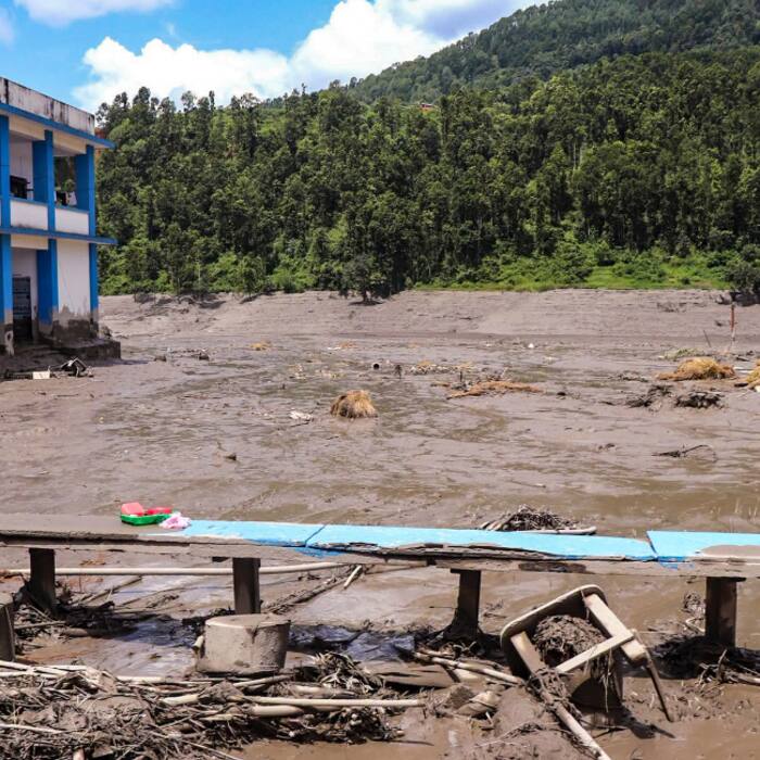 Rescue operation underway after a sudden and massive flood surged through the Bhote Koshi River, killing four people, in Rasuwa, Nepal.