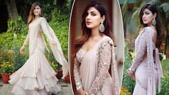 Rhea Chakraborty Sets Hearts Ablaze as She Dazzles in Lehenga-Style Ruffle Peach Saree- See Stunning PICS