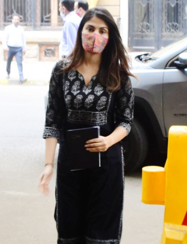 Rhea Chakraborty wears a black suit as she visits NCB office