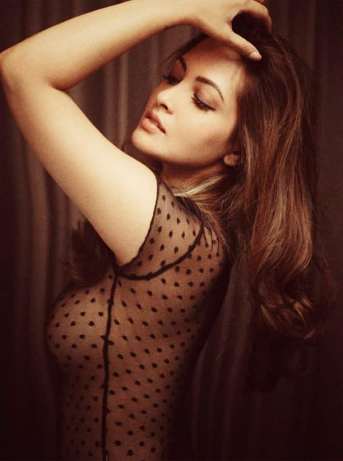 Riya Sen Showing Off Her Body in Sheer Black Top