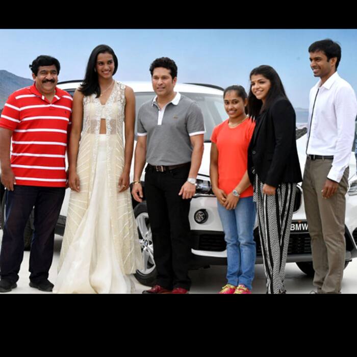 Sachin Tendulkar poses with Olympics stars during an event