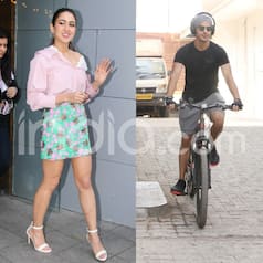 Sara Ali Khan Glows in Pink While Ishaan Khatter Rides Bike on Mumbai Roads Wearing Headphones