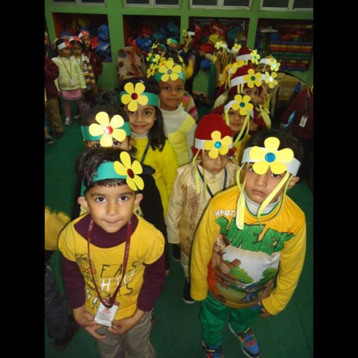 School kids dressed in yellow to mark Vasant Panchmi