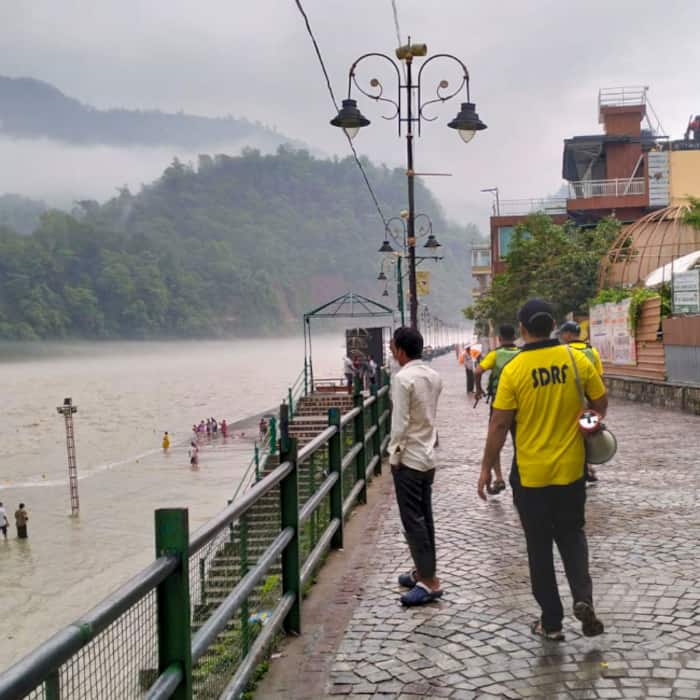 SDRF personnel patrolling Ganga riverfront after heavy rain in Rishikesh