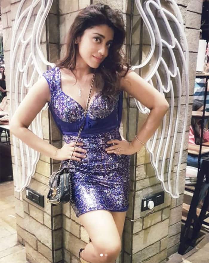 Shriya Saran flaunts her toned figure in Purple dress