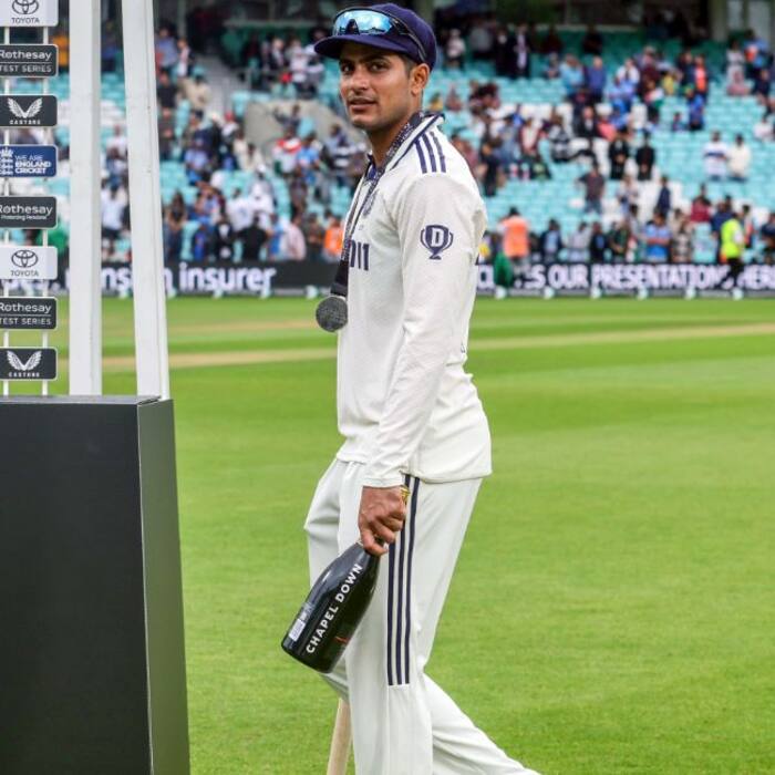 Shubman Gill accepted his bottle of Champagne