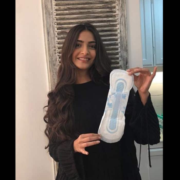 Sonam Kapoor with a pad in her hand