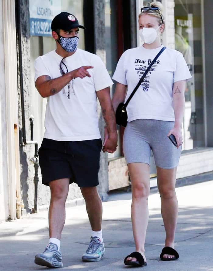 Sophie covered up baby bump and stayed comfortable with sandals