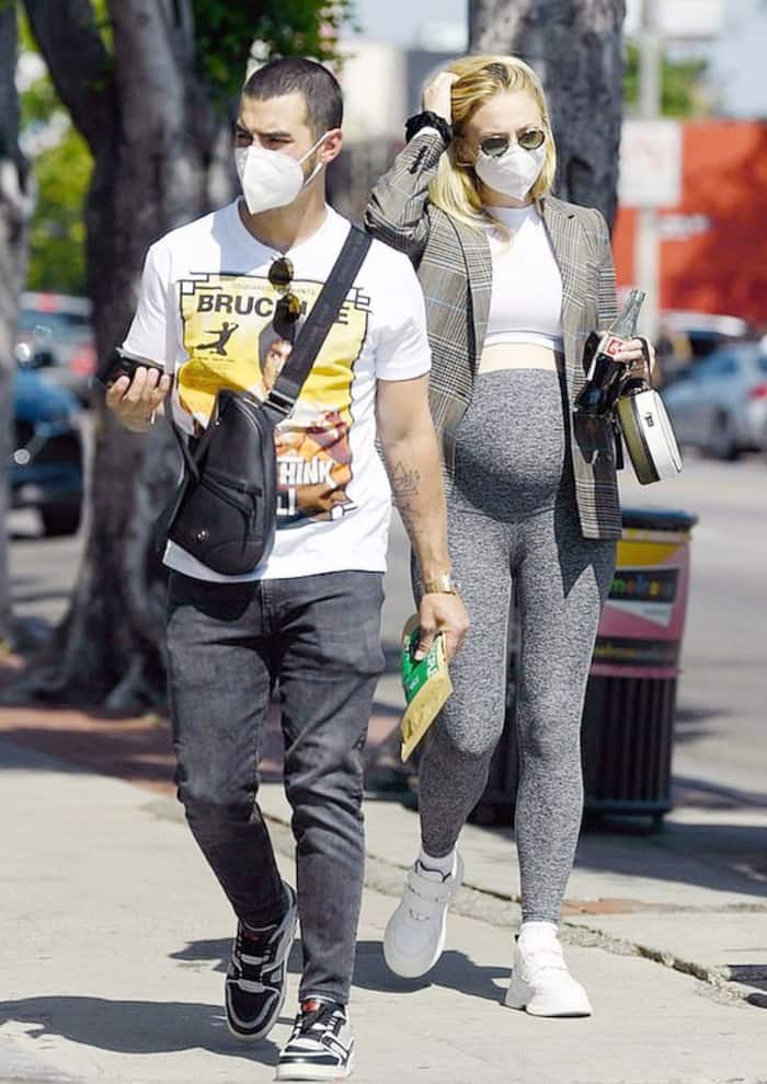 Sophie Turner followed coronavirus safety recommendations by wearing mask