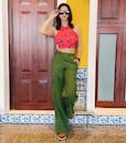 Sunny Leone Looks Vibrant in Pink Crop Top And Green Trousers - See Hot Photos