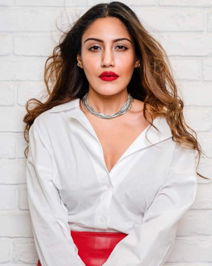 Surbhi Chandna completes her look with bright makeup