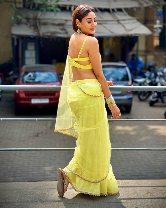 Surbhi Chandna flaunts her flawless figure in a net saree this time