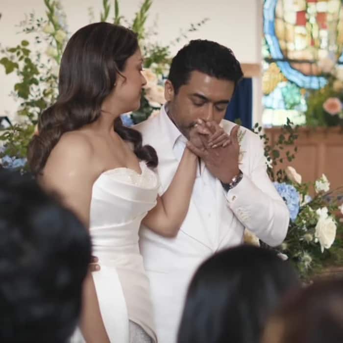 Suriya looks dapper in a white suit: The actor complemented Jyotika in a classic white suit.