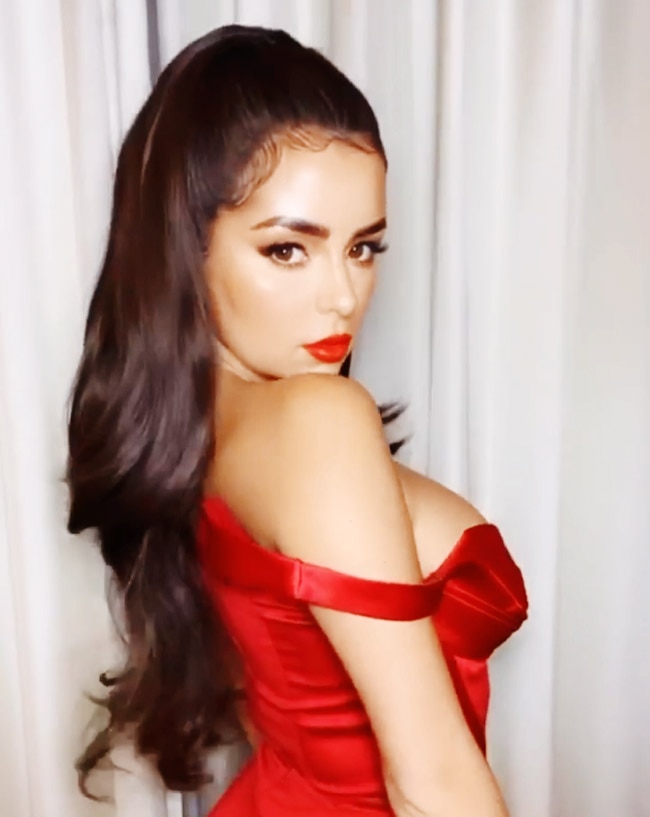 demi rose red dress Demi Rose reveals a glimpse of her bum in a red minidress as she enjoys ice cream in Ibiza