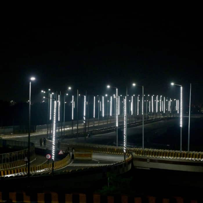 The newly inaugurated Barapullah Elevated Road Phase-III illuminated with decorative lights at night near Barapullah, in New Delhi.