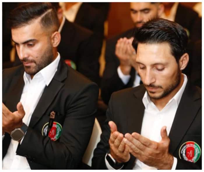 Two Afghanistan players offer prayers before leaving for the ICC World Cup 2023 in India 