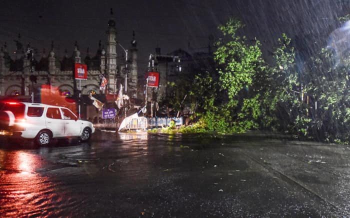 Uprooted Tree, Waterlogged Streets in Kolkata After Cyclone Amphan