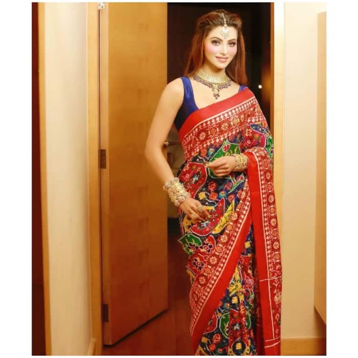 Urvashi Rautela wears her Patola saree with heavy gold jewellery