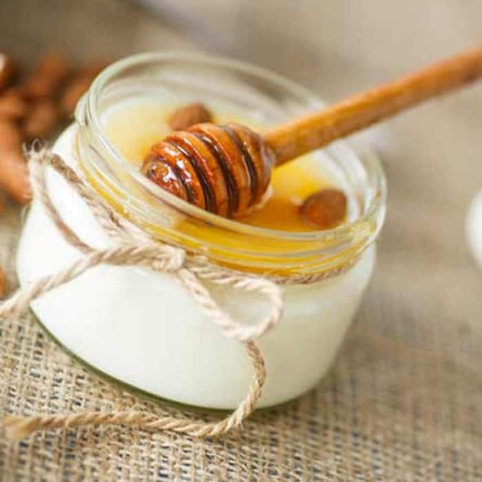 Use honey and curd pack to deal with split ends