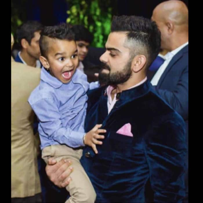 Virat Kohli with Shikhar Dhawan’s son Zorawar