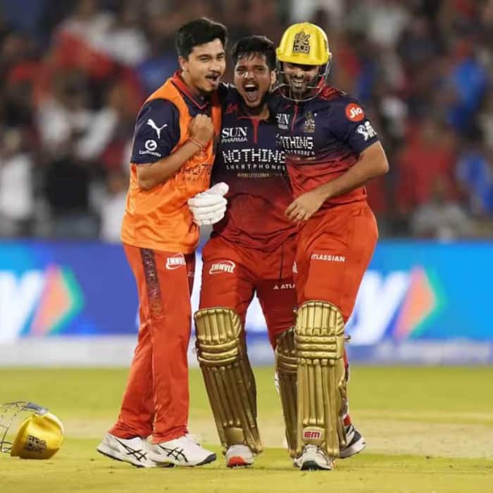 Virat Kohlis RCB squeezed past MI by 2 wickets