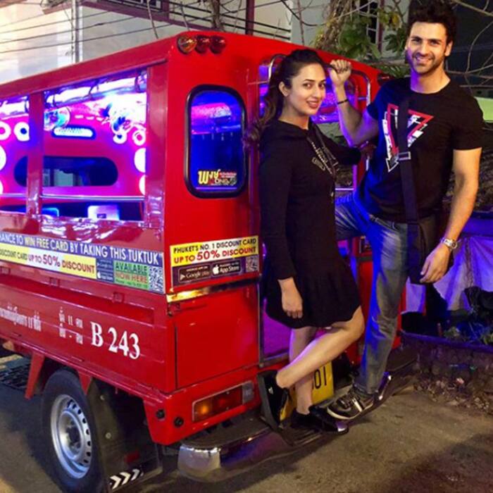 Vivek Dahiya and Divyanka Tripathi Dahiya posing with the Tuk Tuk