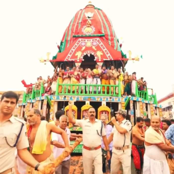 Volunteers and security teams manage the crowds during Jagannath Rath Yatra