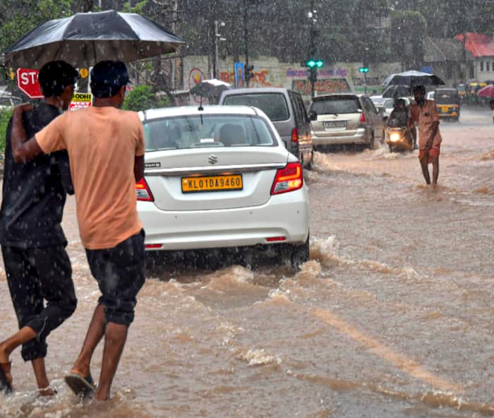 Kerala Raining Kerala Rains: Heavy rains Disrupt Life in Kerala. See Photos Here