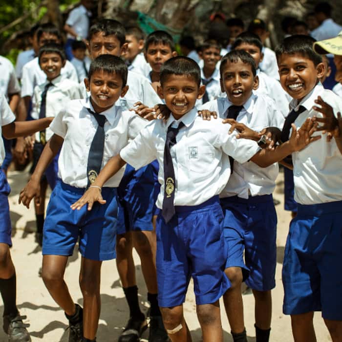 What do you mean by Government school and Government-aided school?