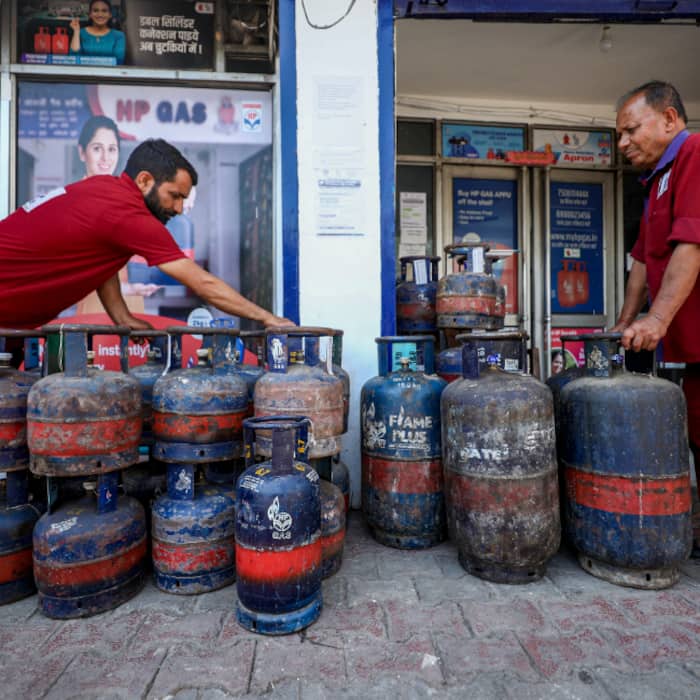 Where can consumers track previous LPG bookings and refill status?